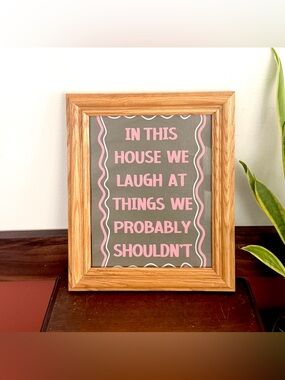 In This House, We Laugh at Things We Probably Shouldn’t Quirky Wall Art Framed